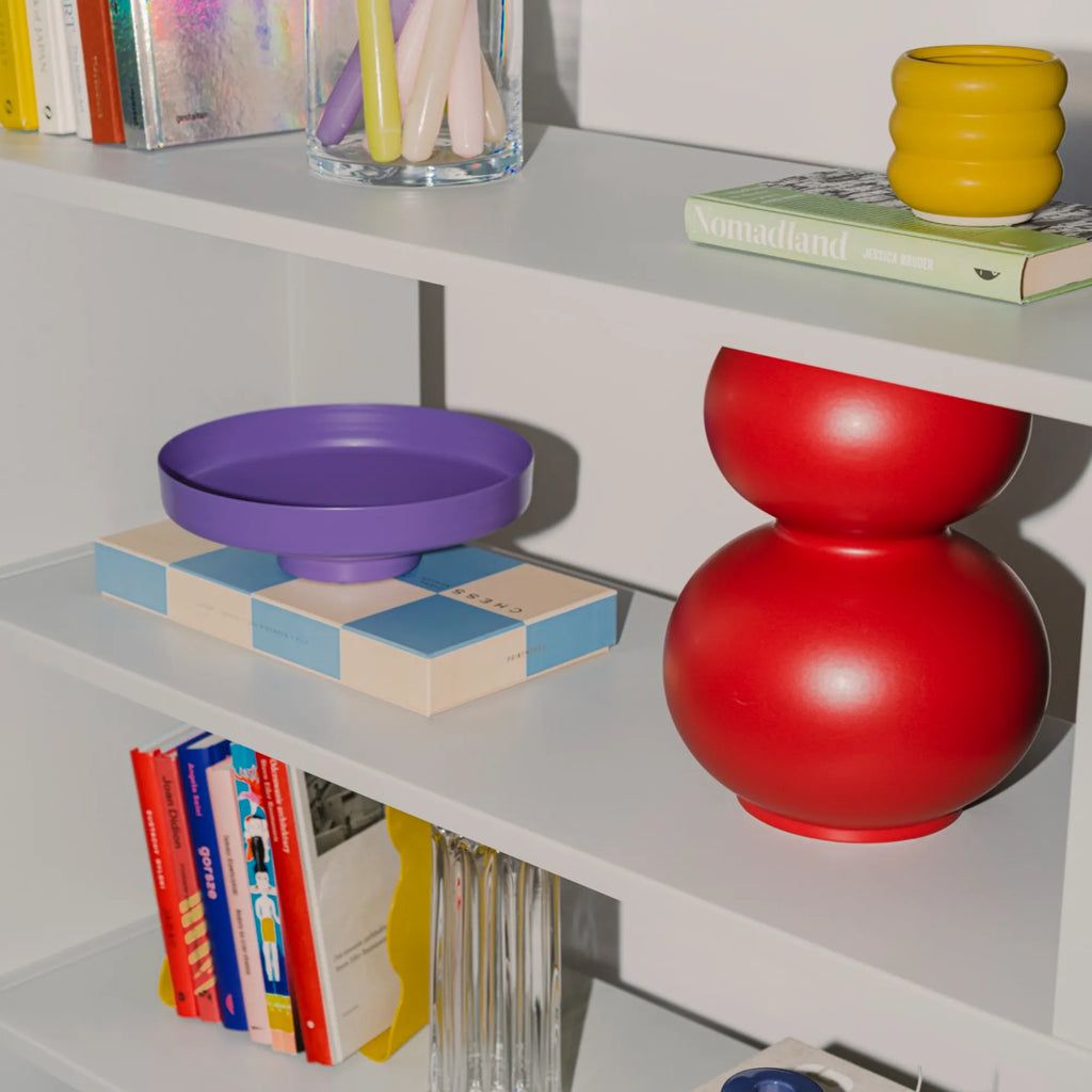  Vilu Bowl being used as a decorative piece on a living room shelf 