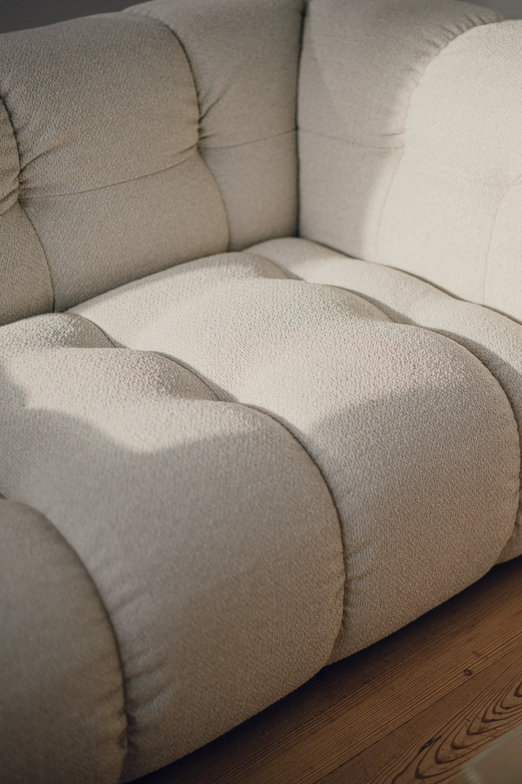 noo.ma Bolbi Sofa 2-seater, a contemporary modular sofa featuring natural cream-colored, textured bouclé upholstery with distinctive rounded, deep tufting and a plush, inviting silhouette.