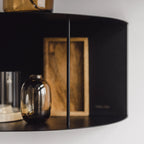 Lina Shelf in black finish, adding an elegant touch to any room