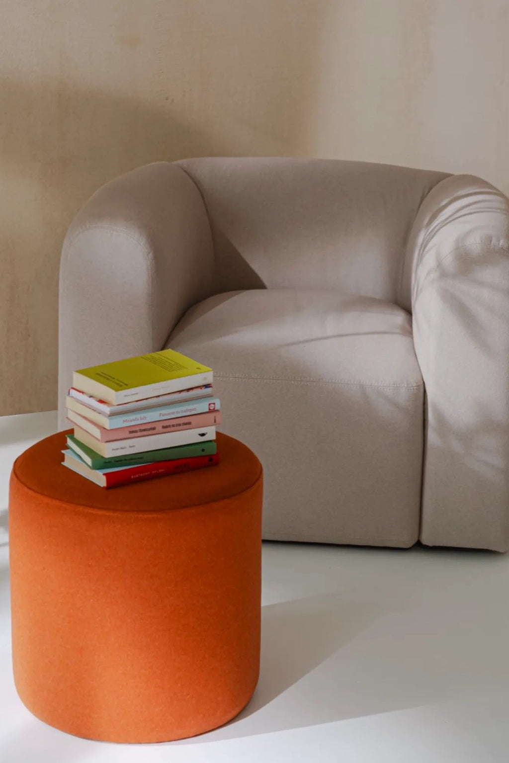 Close-up of Folk Pouf - Tall with Wooden Legs and Neutral Color