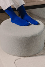 Folk Pouf - Low featuring intricate handwoven patterns and fringed edges