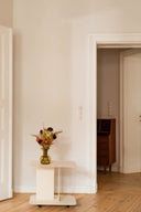 HO Trolley model in a historic urban setting with cobblestone streets