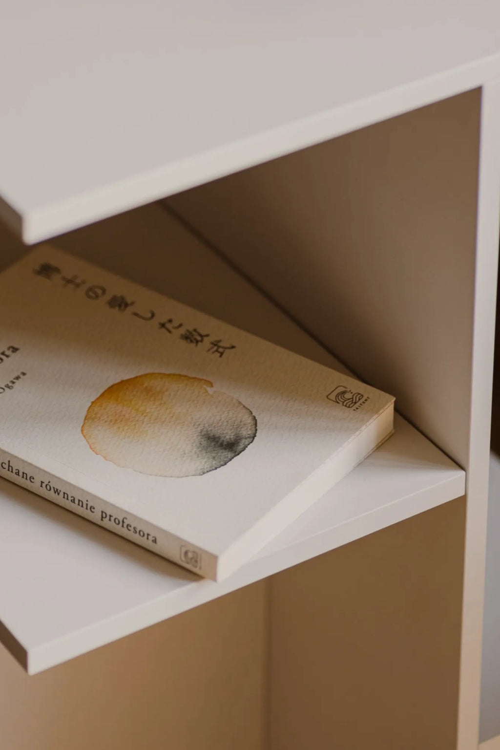 Atik Bedside Table in warm walnut finish with ample storage space