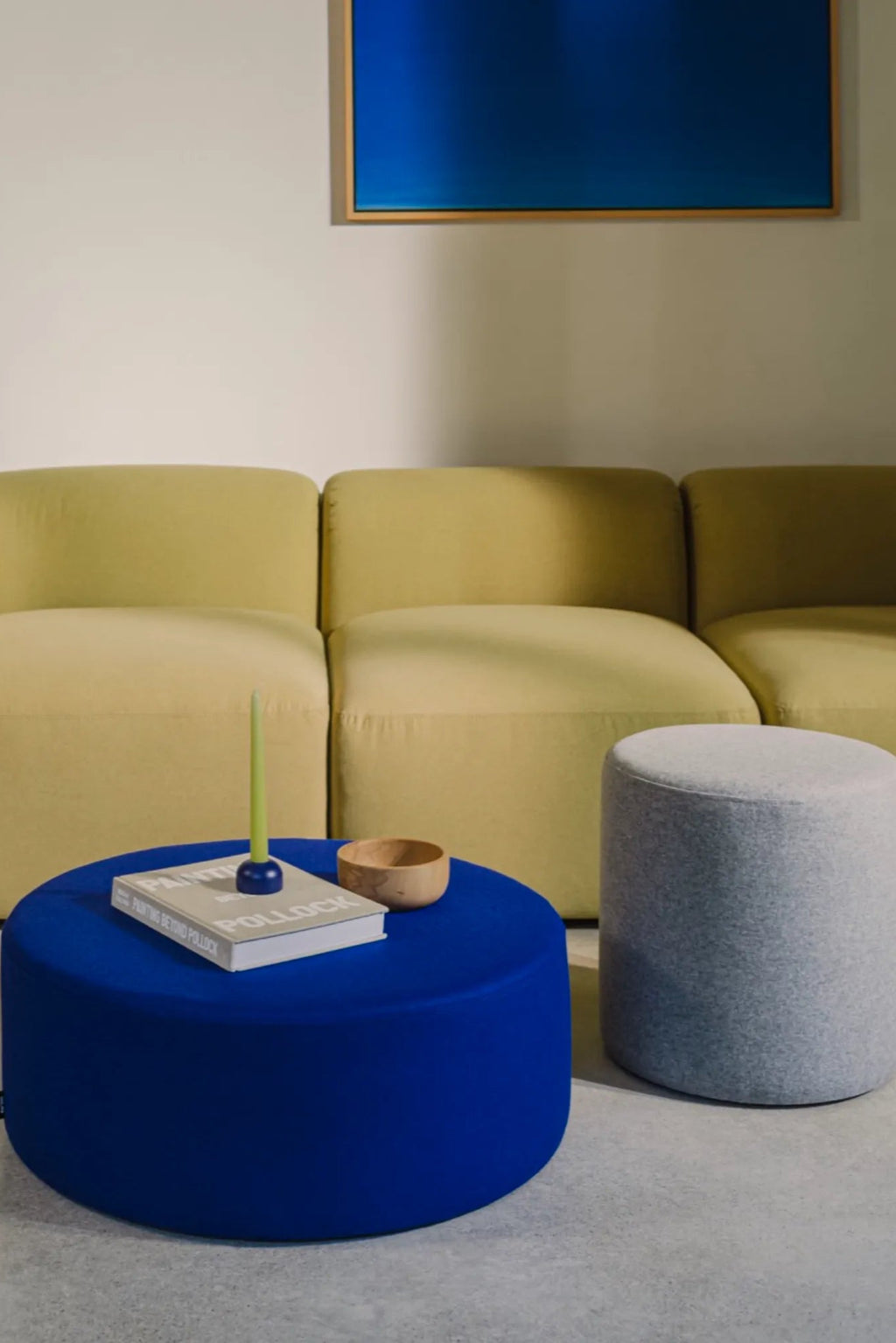 Handwoven textured beige and cream wide folk pouf perfect for casual seating