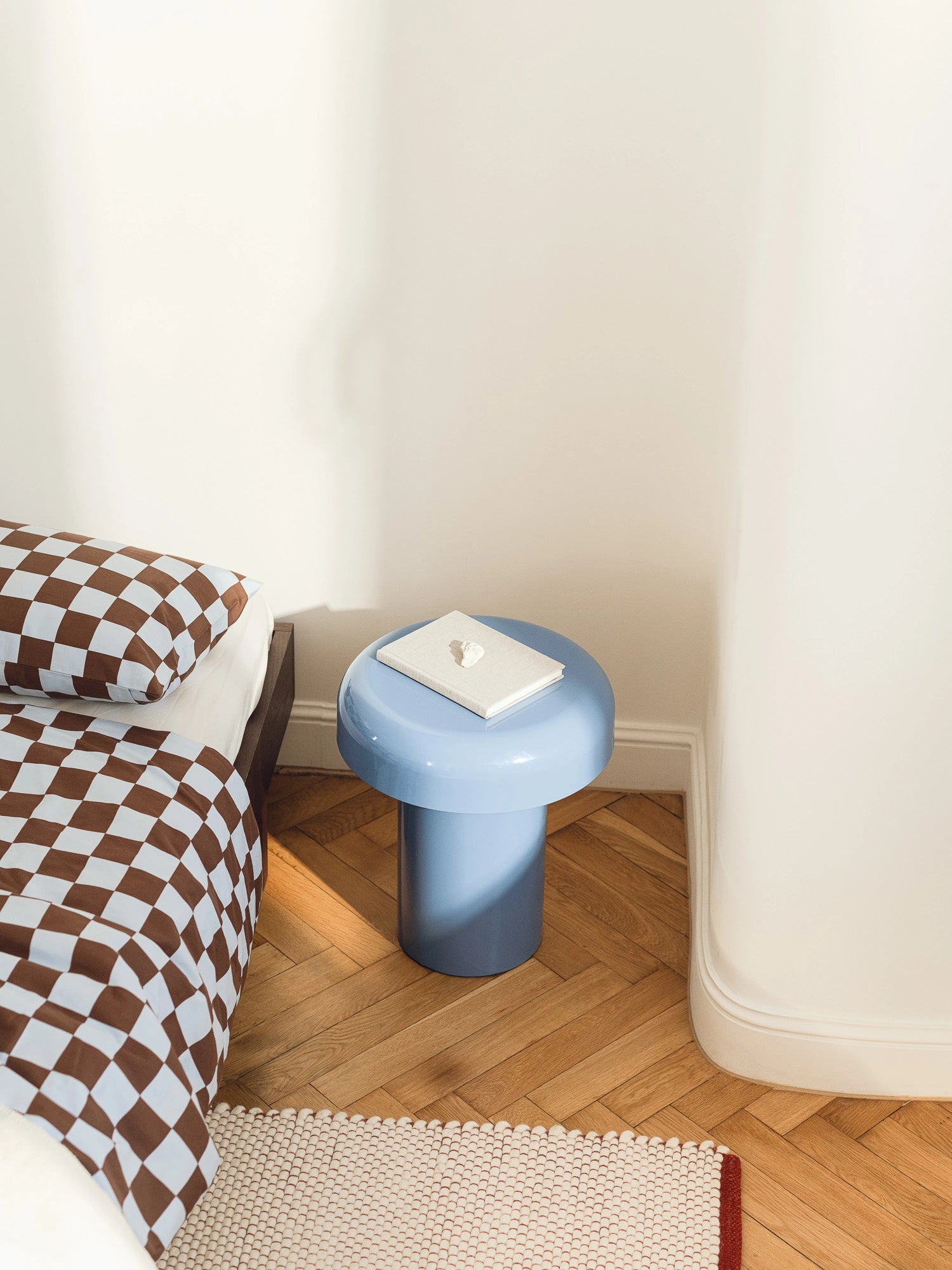 noo.ma Miko Side Table, a modern minimalist accent table in a striking periwinkle blue with a smooth lacquered finish and a sculptural mushroom-like silhouette, featuring a rounded top and a.