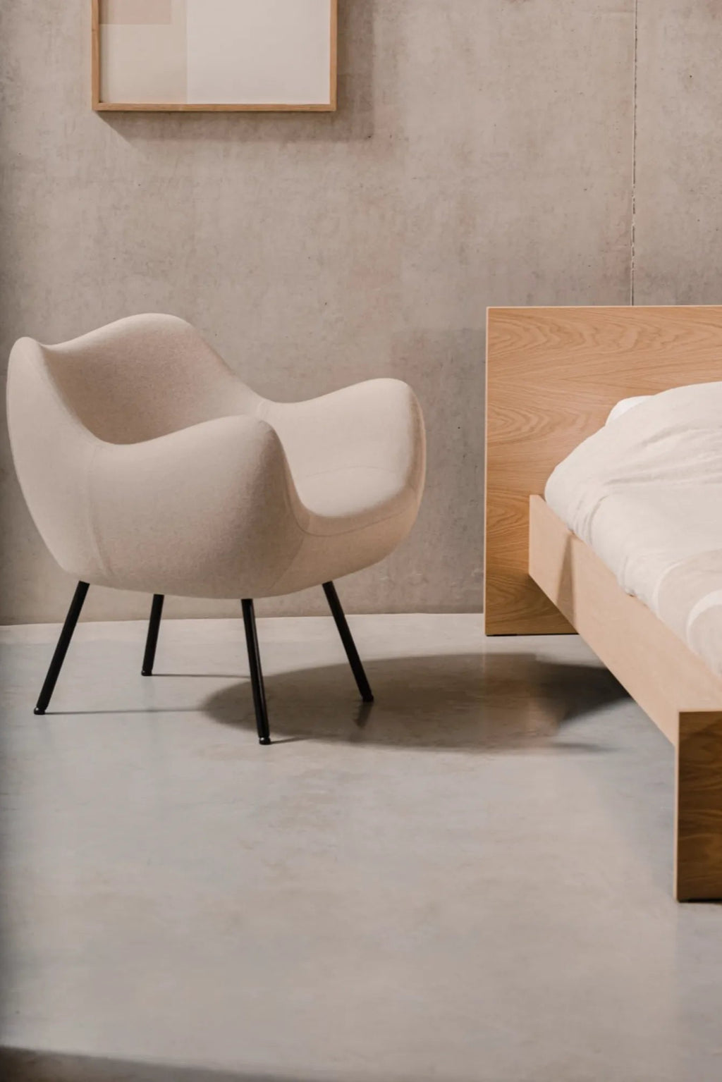 RM58 Armchair in elegant navy blue fabric, perfect for modern living rooms