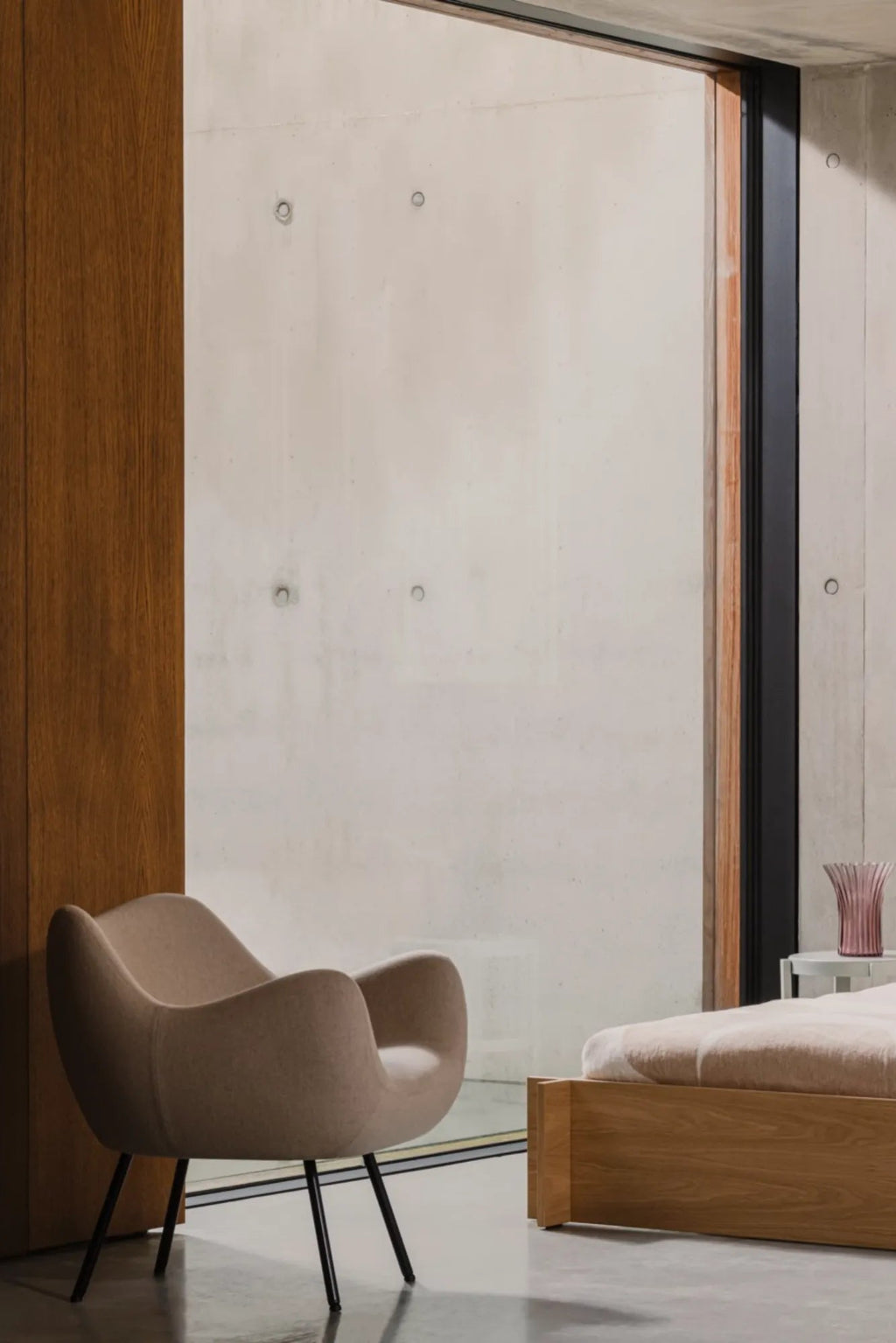 Modern RM58 Armchair with grey fabric upholstery and sleek metal legs