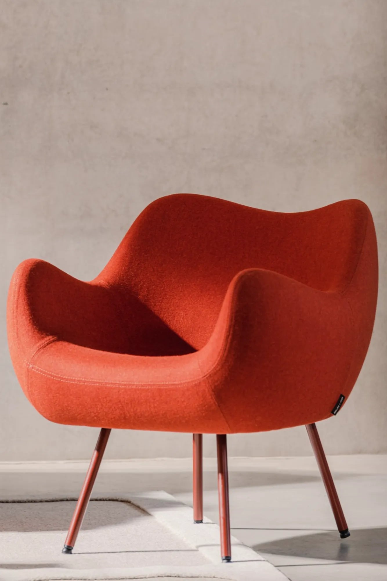 Contemporary RM58 Armchair with sleek design and plush, supportive seating