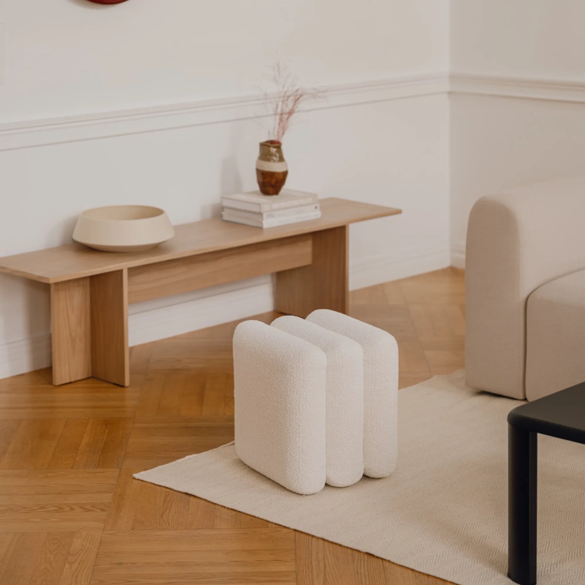 Radd Pouf in rich, earthy tones, adding warmth and comfort to any room