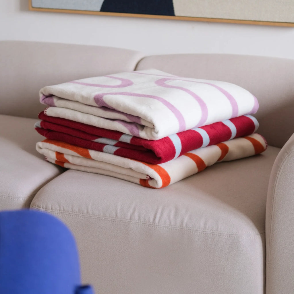 Plush and inviting Swirl Throw Blanket in a rich chocolate brown