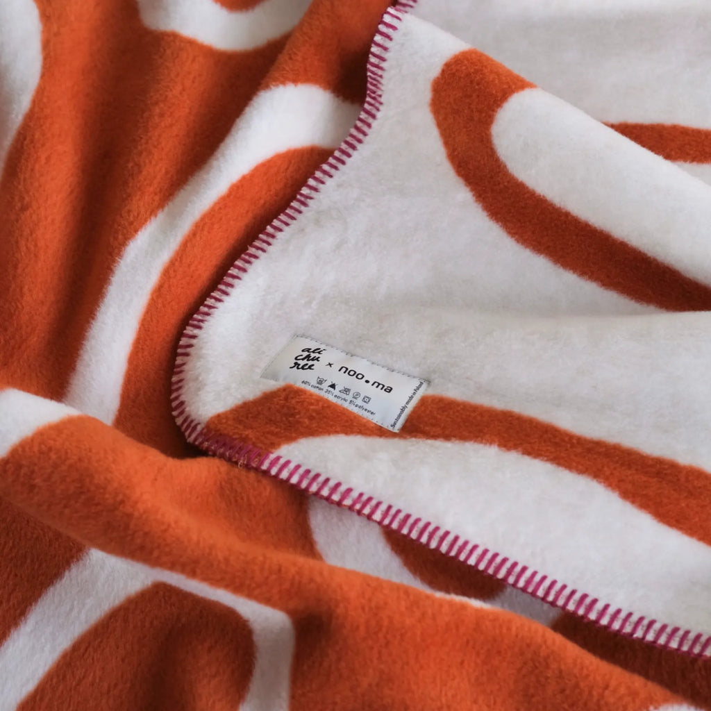 Cozy Swirl Throw Blanket in a lovely lavender shade with a soft feel