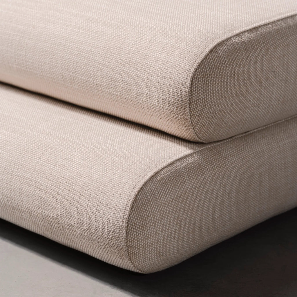  Taso Pouf in warm terracotta fabric, adding warmth and comfort to any space