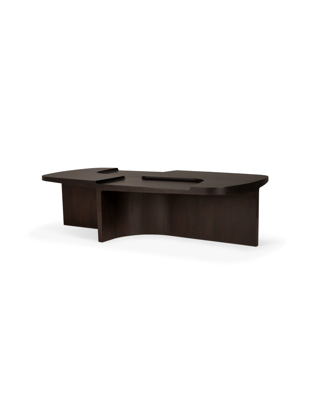 Ethnicraft Brutalist Coffee Table, a striking dark brown solid wood coffee table featuring a bold sculptural design with a geometric base and a thick rectangular top with softly rounded corners. Its robust, architectural form and recessed surface details embody a modern Brutalist aesthetic. Perfect as a statement piece for contemporary living rooms or minimalist lounge areas.