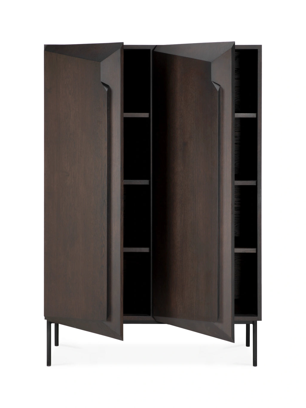 Ethnicraft Stairs Cupboard, a modern minimalist storage cabinet crafted from solid dark wood with a rich wenge finish and distinctive faceted door edges that create a sculptural "stair" effect, featuring a black interior with shelving and slender matte black metal legs. This contemporary dark wood cupboard is ideal for stylish living room storage or a sophisticated dining room accent.