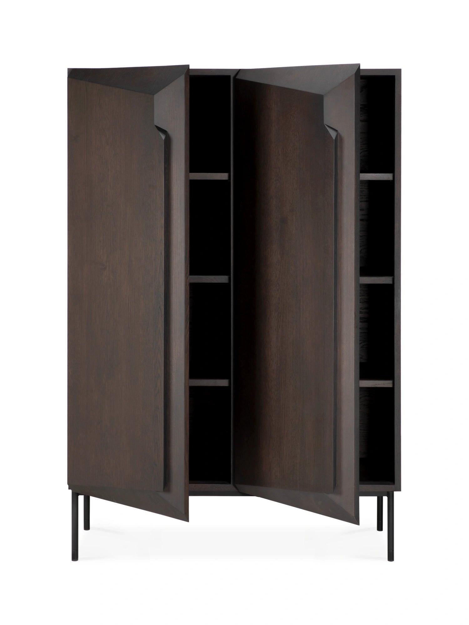 Ethnicraft Stairs Cupboard, a modern minimalist storage cabinet crafted from solid dark wood with a rich wenge finish and distinctive faceted door edges that create a sculptural "stair" effect, featuring a black interior with shelving and slender matte black metal legs. This contemporary dark wood cupboard is ideal for stylish living room storage or a sophisticated dining room accent.