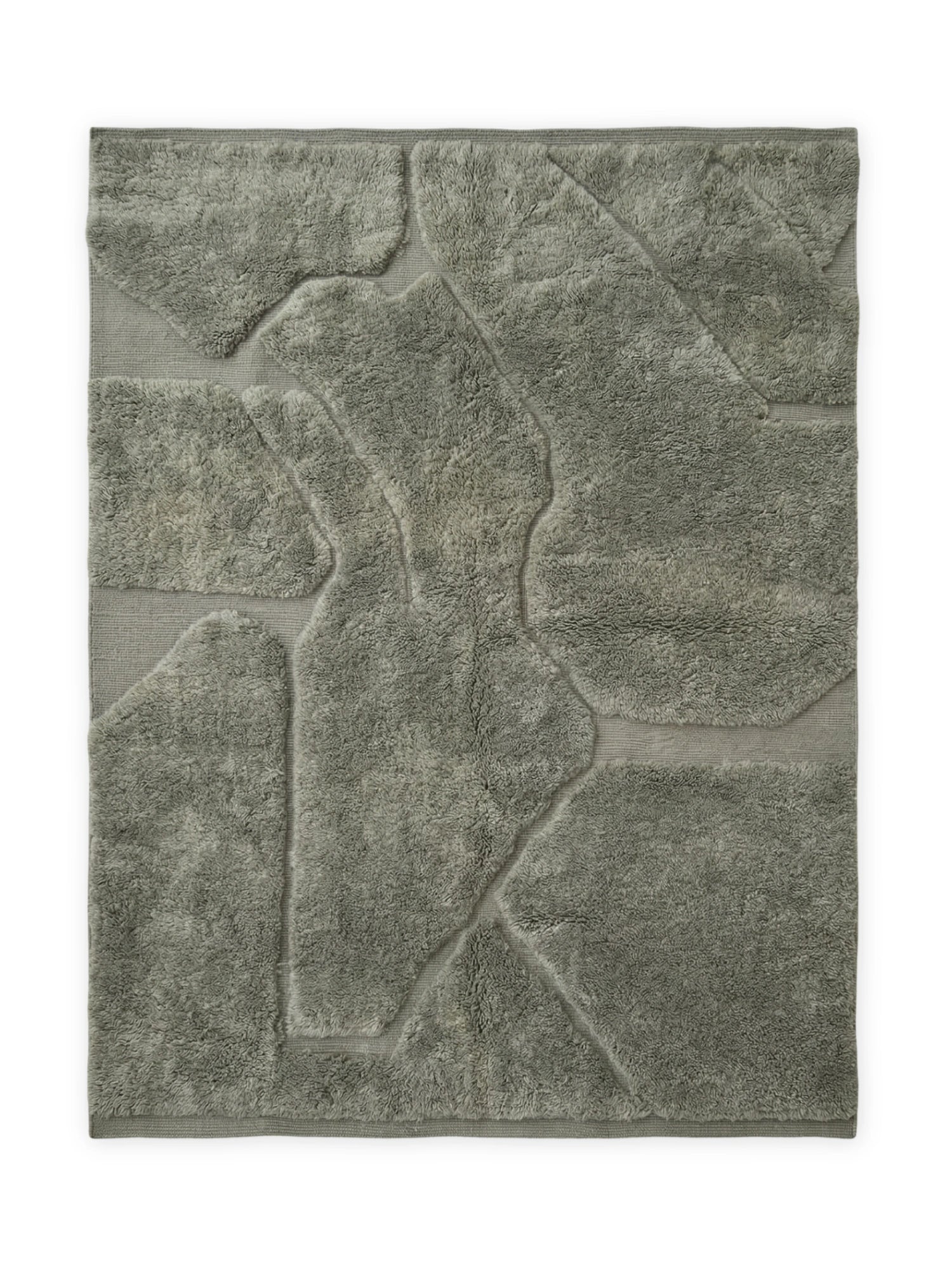 TCL Studios Atlas Mrirt Rug, a hand-knotted wool area rug in a muted sage green, featuring a unique sculptural design with contrasting high pile shaggy textures and low pile flat weave sections forming organic, abstract shapes.