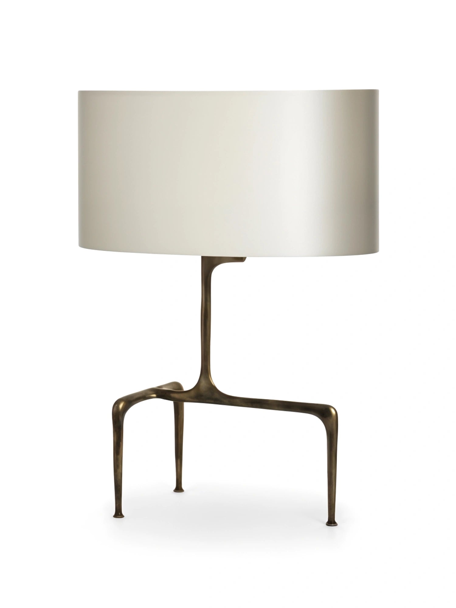 CTO Lighting Braque Table Lamp in antique bronze finish, featuring a sleek cream fabric shade and a unique, elegant tripod base, displayed on a clean white background.
