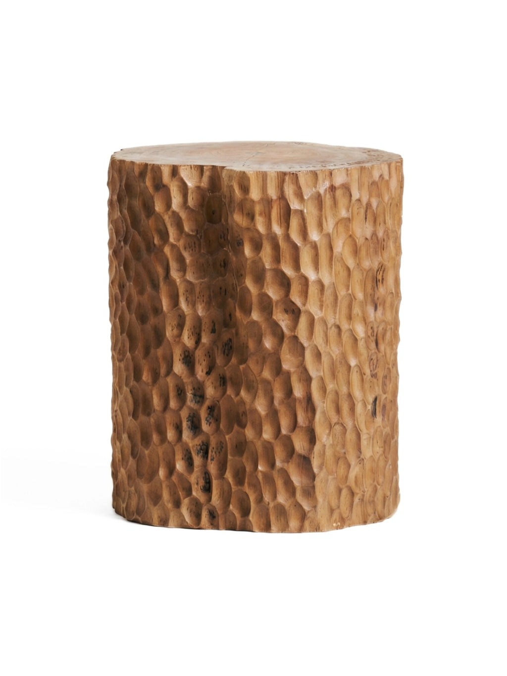 Heaps & Woods Clara Stool, a cylindrical solid wood stool featuring a deeply hand-carved, textured surface with an organic honeycomb pattern in warm natural brown tones. This rustic wood block design offers a unique tactile experience and a grounding aesthetic. Perfect as a versatile accent piece, side table, or plant stand for organic modern, wabi-sabi, or contemporary living rooms and bedrooms.