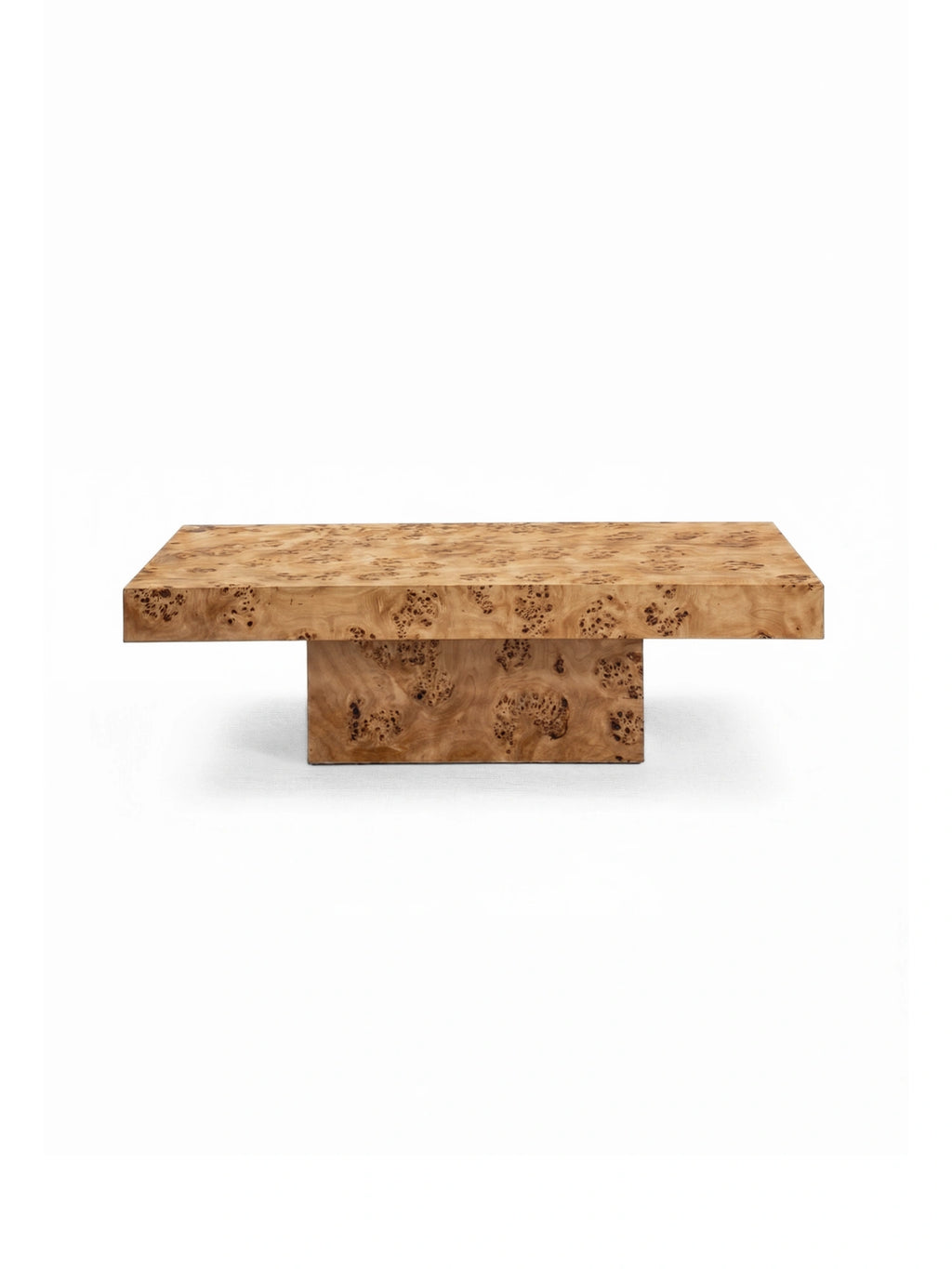 TCL Studios Dune Burlwood Coffee Table, a contemporary rectangular coffee table crafted from stunning natural burlwood, showcasing a unique, intricate grain pattern and warm, rich tones. Its low-profile design features a thick top resting on a sculptural plinth base, creating a minimalist yet impactful statement piece. Perfect for organic modern or sophisticated living room interiors.