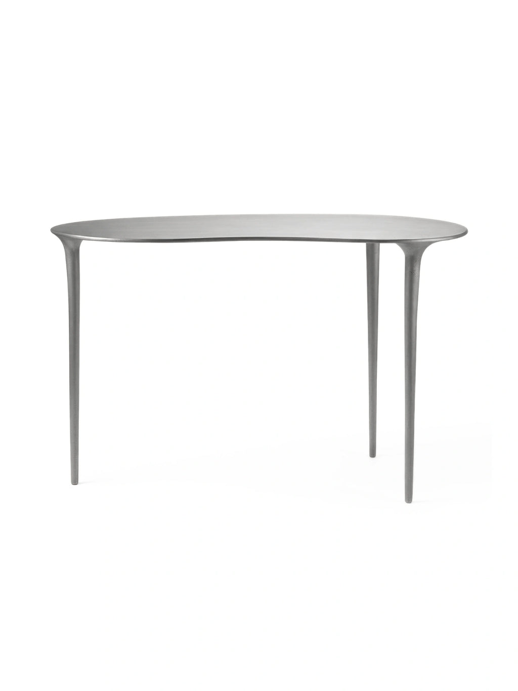 Tine K Dune Recycled Aluminium Desk, a modern minimalist desk crafted from matte grey recycled aluminum with an elongated oval tabletop and sculptural, organically tapered legs. This contemporary metal desk is ideal for a stylish home office or as a sleek console table in a minimalist living room or entryway.