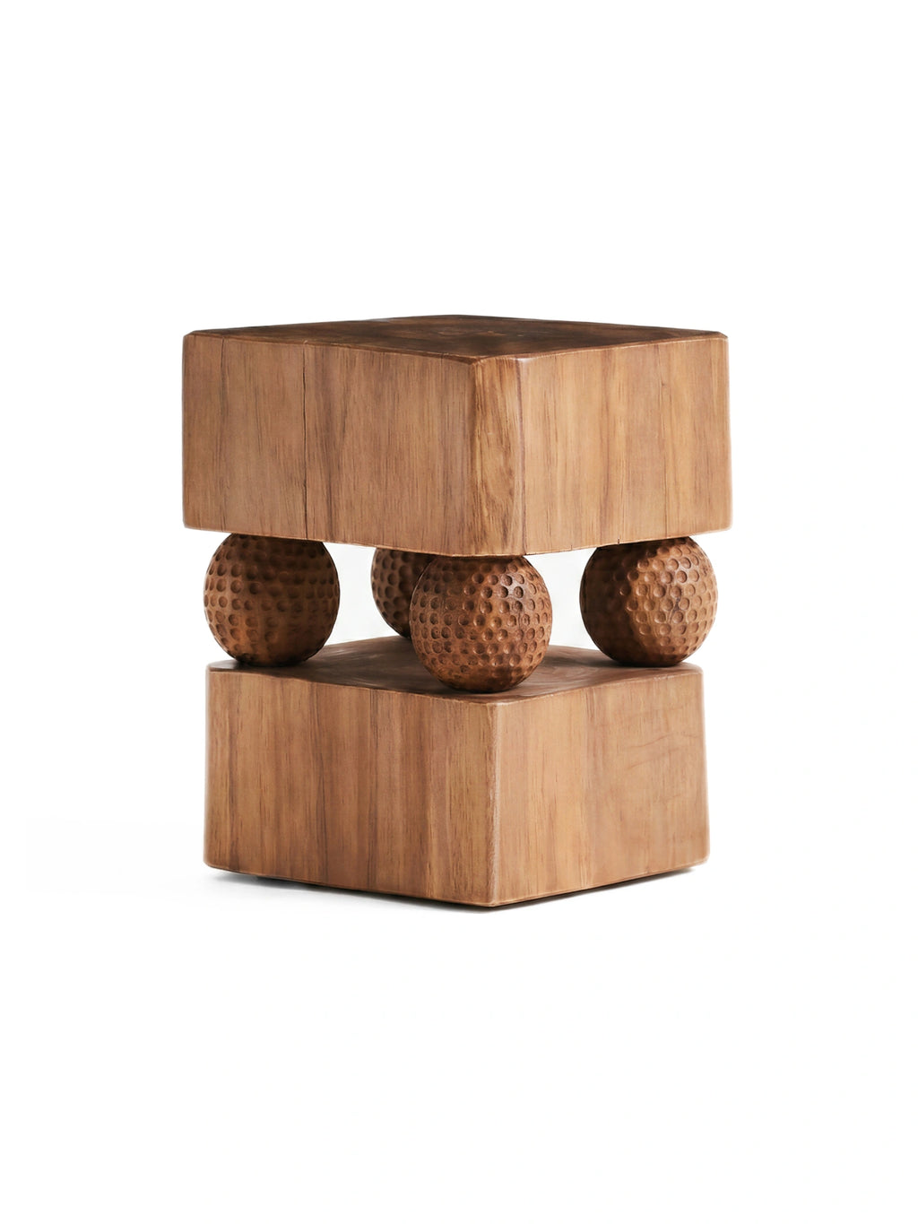 Heaps & Woods Gabi Stool, a unique organic modern stool crafted from solid teak wood, featuring two robust square-shaped blocks separated by four distinctive dimpled wood spheres. This brutalist-inspired natural wood side table showcases rich brown tones and a compelling textured design. Ideal as an accent stool or decorative side table for contemporary living rooms, bedrooms, or entryways.
