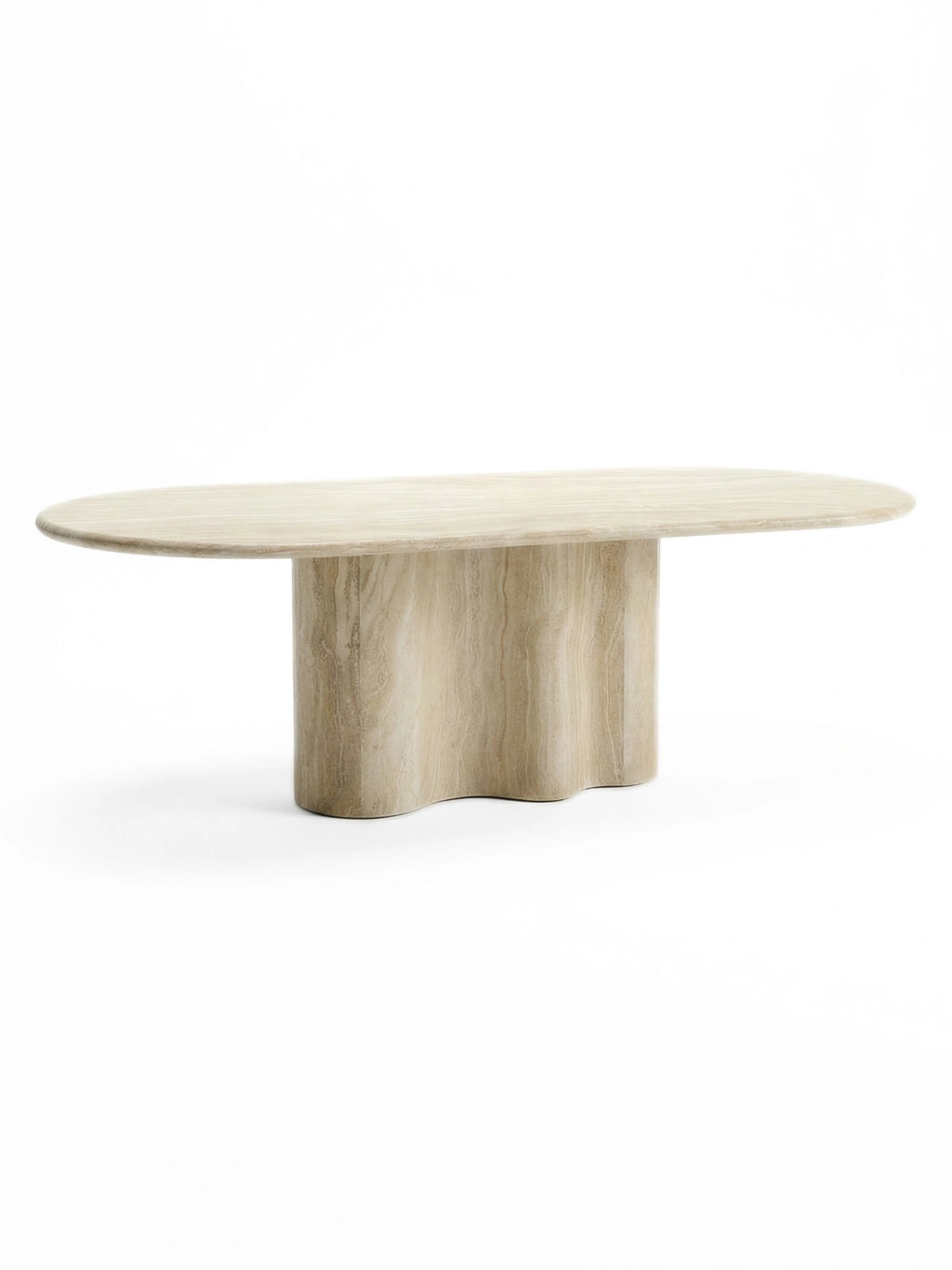 TCL Studios Galatea Travertine Dining Table, an organic modern dining table featuring a smooth oval travertine tabletop with natural veining and a sculptural, wavy pedestal base crafted from solid travertine. The creamy beige natural stone offers a beautiful porous texture and minimalist aesthetic. Perfect for contemporary dining rooms, minimalist kitchens, or brutalist-inspired interior spaces.