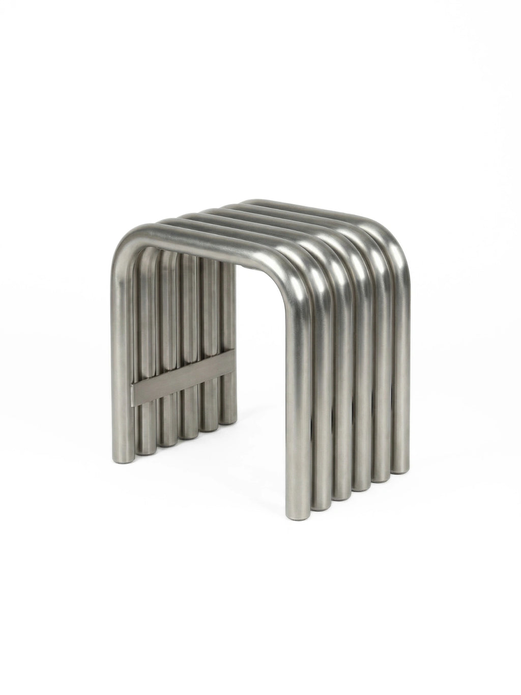noo.ma Nokk Stool, a modern minimalist stool crafted from brushed stainless steel with a striking architectural form made of multiple U-shaped cylindrical tubes. Its matte silver finish and industrial chic aesthetic create a versatile brutalist design piece. Perfect as a contemporary accent stool for living rooms, bedrooms, or an entryway bench.