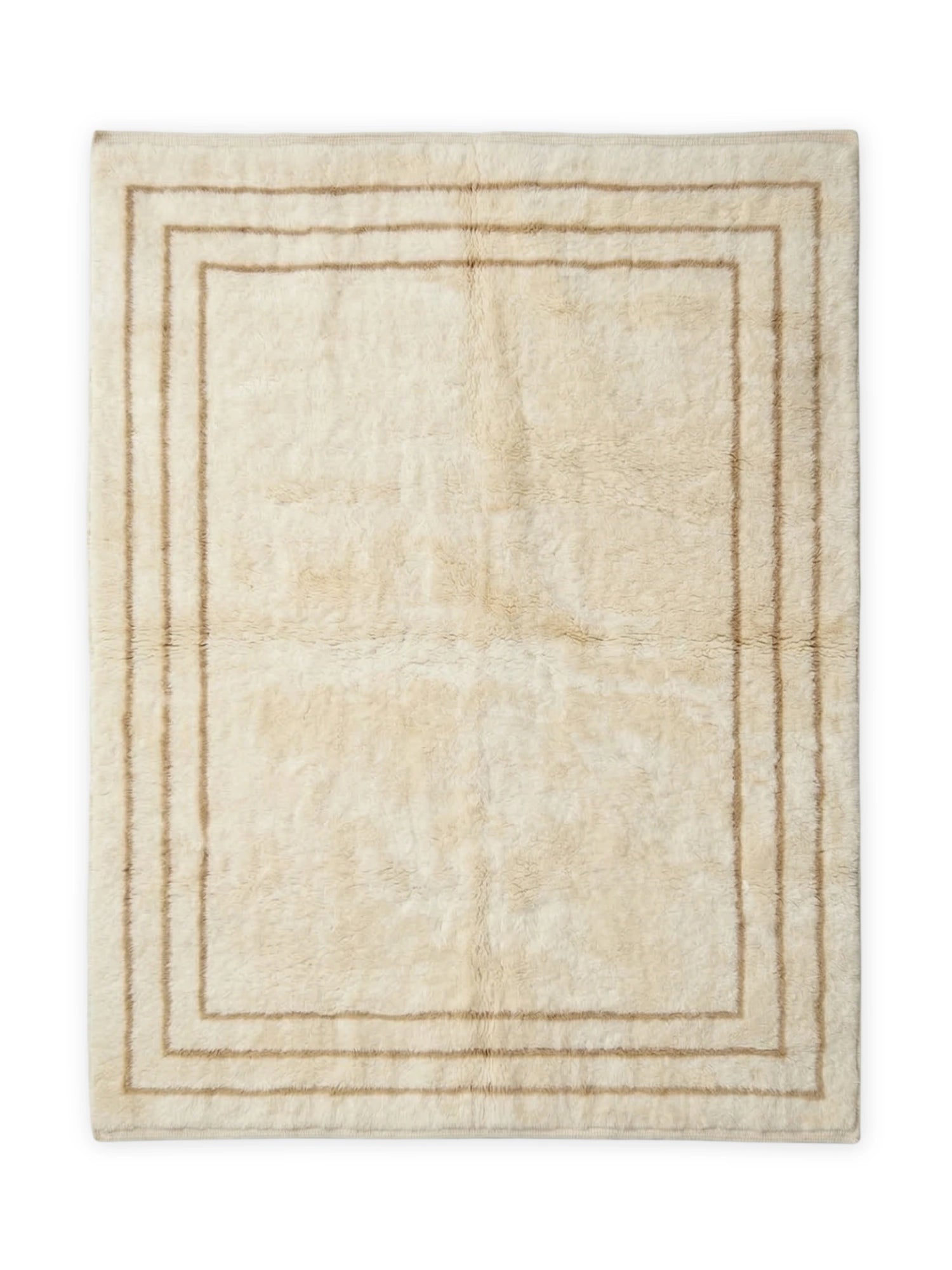 TCL Studios Outline Mrirt Rug, a premium hand-knotted wool area rug showcasing a plush, high-pile cream texture with a distinct double geometric outline in a warm light brown hue.