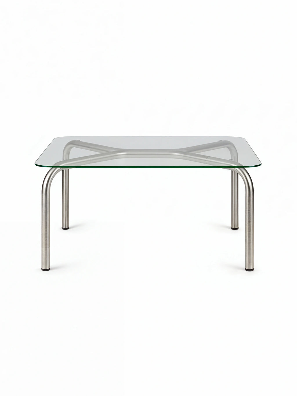 noo.ma Uku Coffee Table, a square glass coffee table with elegant brushed silver metal legs, showcasing its minimalist and versatile design. The table is presented on a crisp white background, highlighting its clean form and modern appeal.