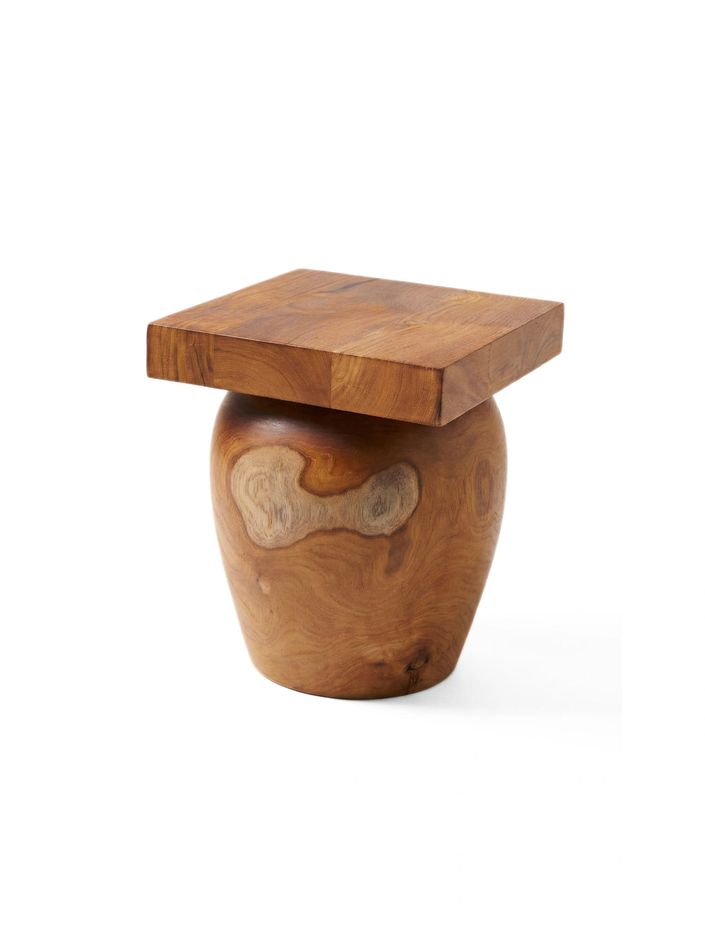 Heaps & Woods Valentina Stool, a sculptural organic modern accent stool hand-carved from solid wood, showcasing rich natural brown tones and unique grain patterns.