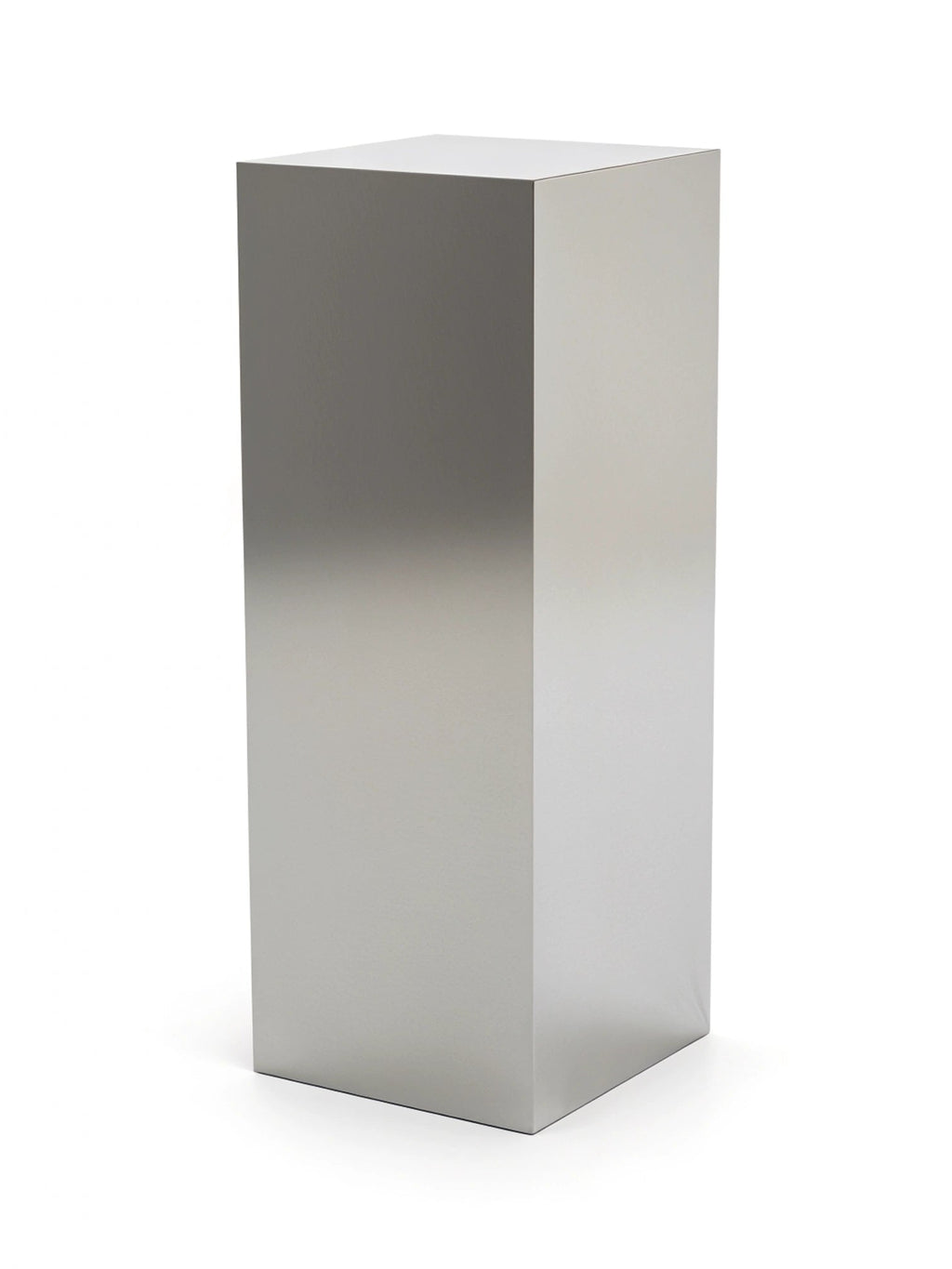 TCL Studios Stainless Steel Pedestal Stand, a tall, rectangular silver column with a polished, reflective surface, displayed on a clean white background, showcasing its minimalist and versatile design.