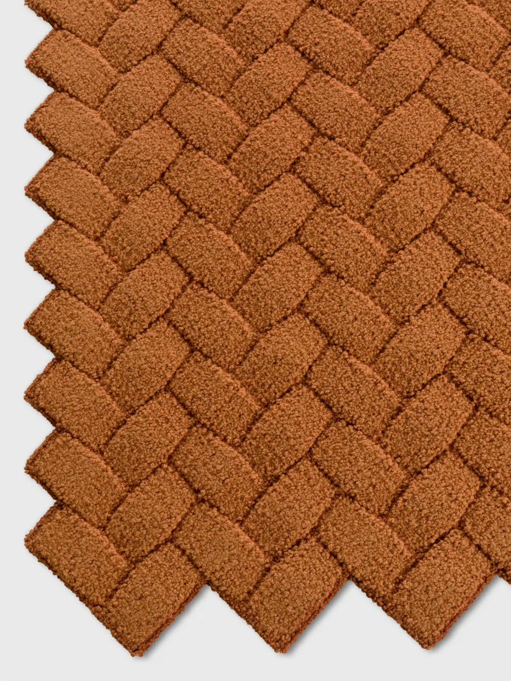 alp_ Palma Bicolor Rug, a richly textured contemporary area rug in a warm terracotta brown, featuring a distinctive basket-weave pattern with plush, bouclé-like loops that create depth and.