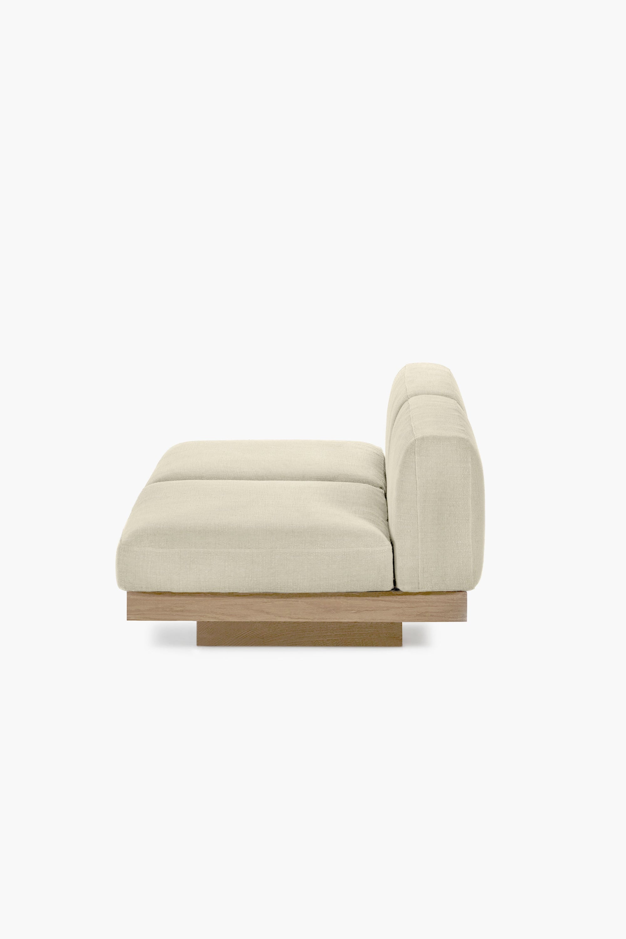 Beige armchair with wooden base on a white background