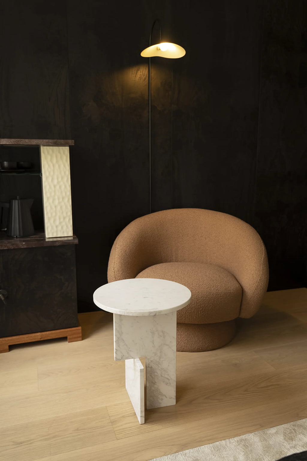 NG DESIGN Object 065 Side Table, crafted from luxury white marble with grey veining, featuring a round top and unique geometric base. Perfect for a chic living room.