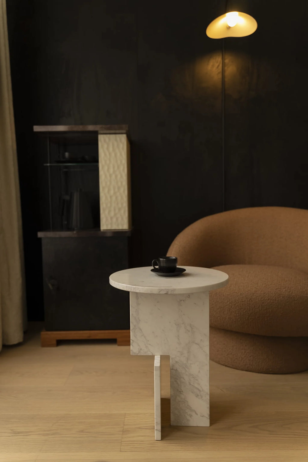 NG DESIGN Object 065 Side Table: A premium modern side table with a round white marble top and asymmetrical rectangular marble leg in a lifestyle setting. Perfect for contemporary living spaces.