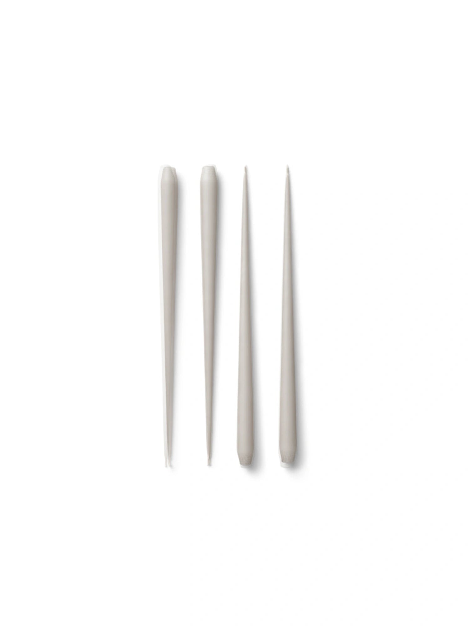 Set of 4 long-lasting and dripless sand color large taper candles.
