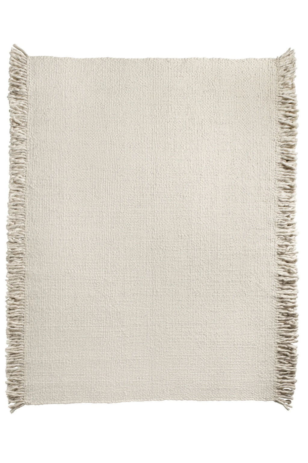 Tine K Sand Wool Rug, a natural sand-colored hand-woven wool rug featuring a richly textured flat-weave construction and stylish fringed edges. This minimalist and organic modern area rug is perfect for adding warmth and Scandinavian coziness to living rooms, bedrooms, or bohemian-inspired spaces.