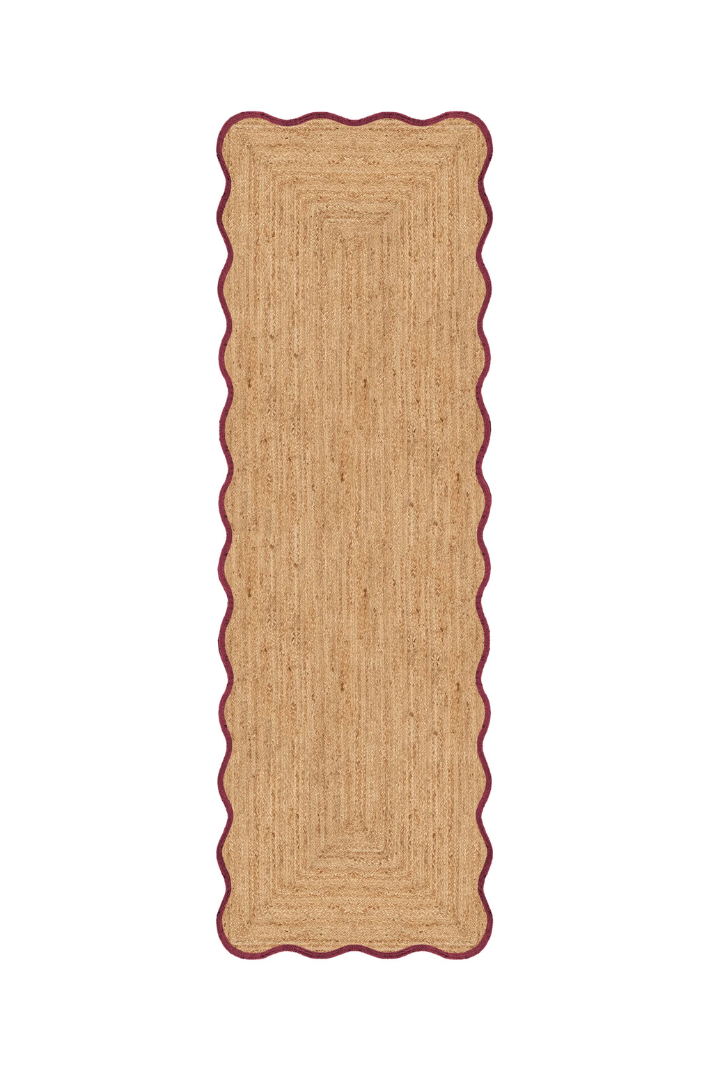 Rectangular braided rug with scalloped edge on a white background