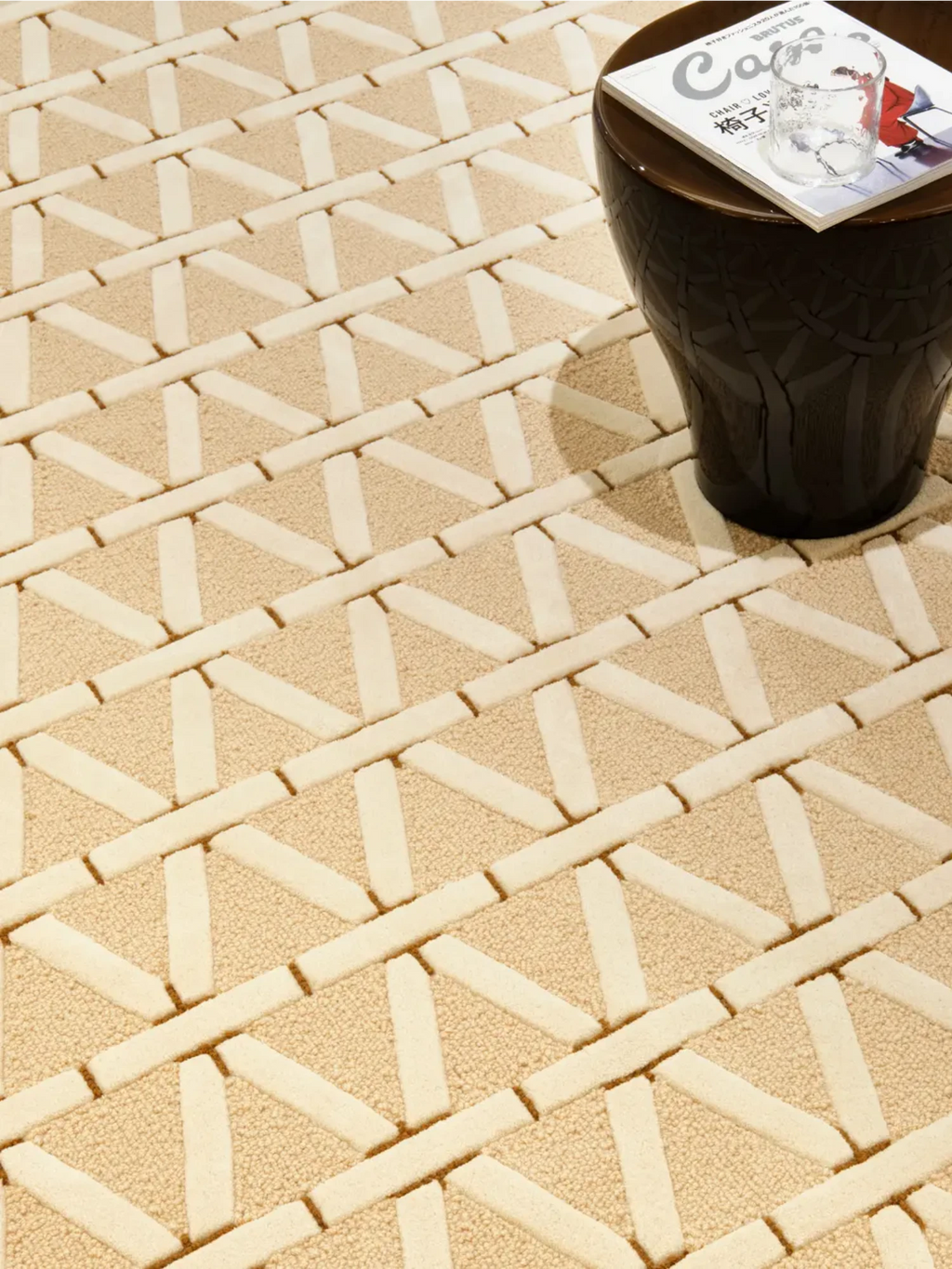 alp_ Secadero Rug, a modern geometric area rug featuring a striking two-tone pattern of cream and beige. This hand-tufted wool rug showcases a textured design with raised, smooth rectangular segments forming a lattice or basketweave, contrasting with a lower, plush loop-pile background in warm natural tones. An ideal contemporary floor covering for minimalist living rooms, Scandinavian bedrooms, or inviting entryways.