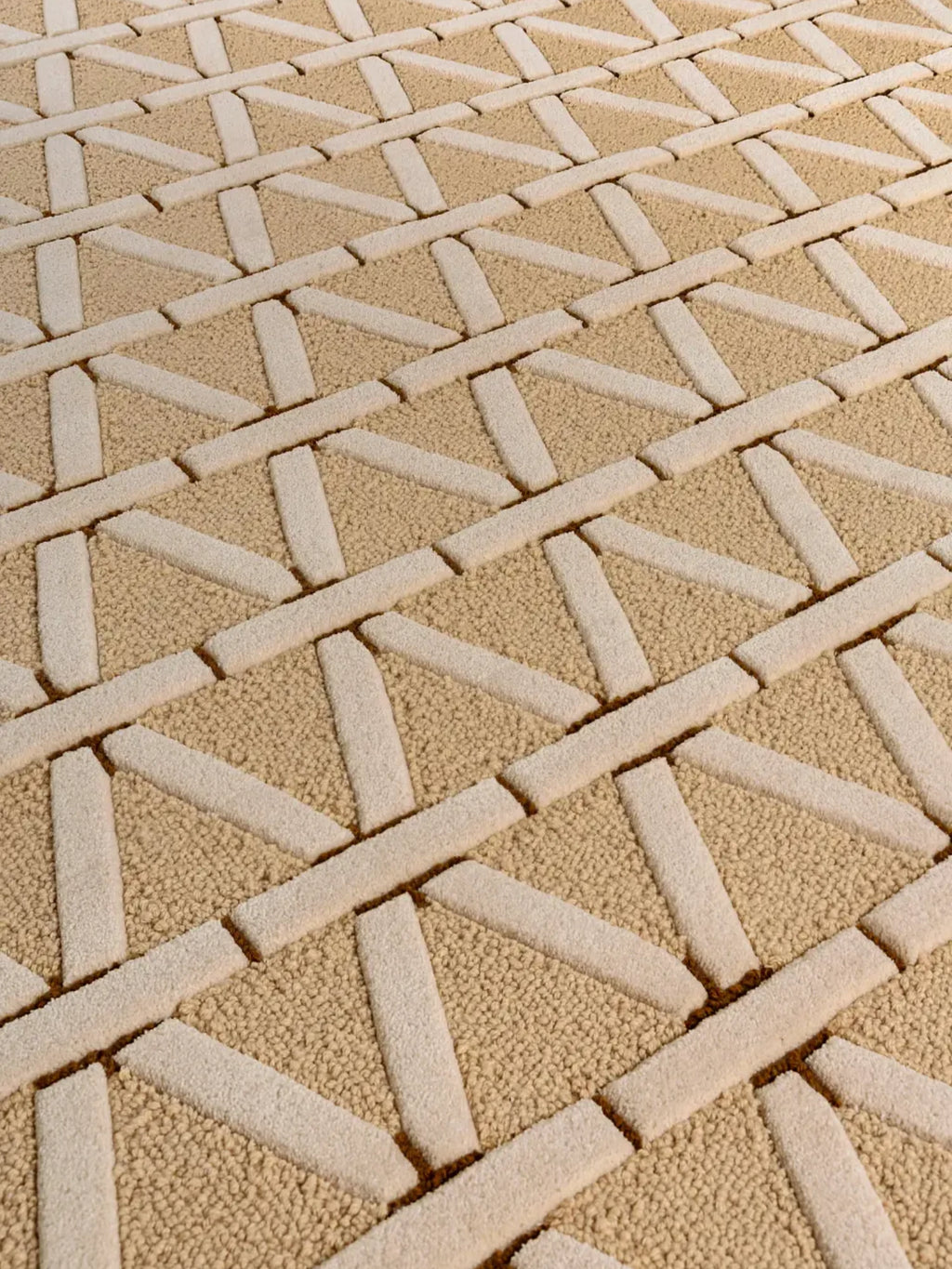 alp_ Secadero Rug, a neutral beige and cream-colored area rug crafted from soft wool with a distinctive sculpted pile.