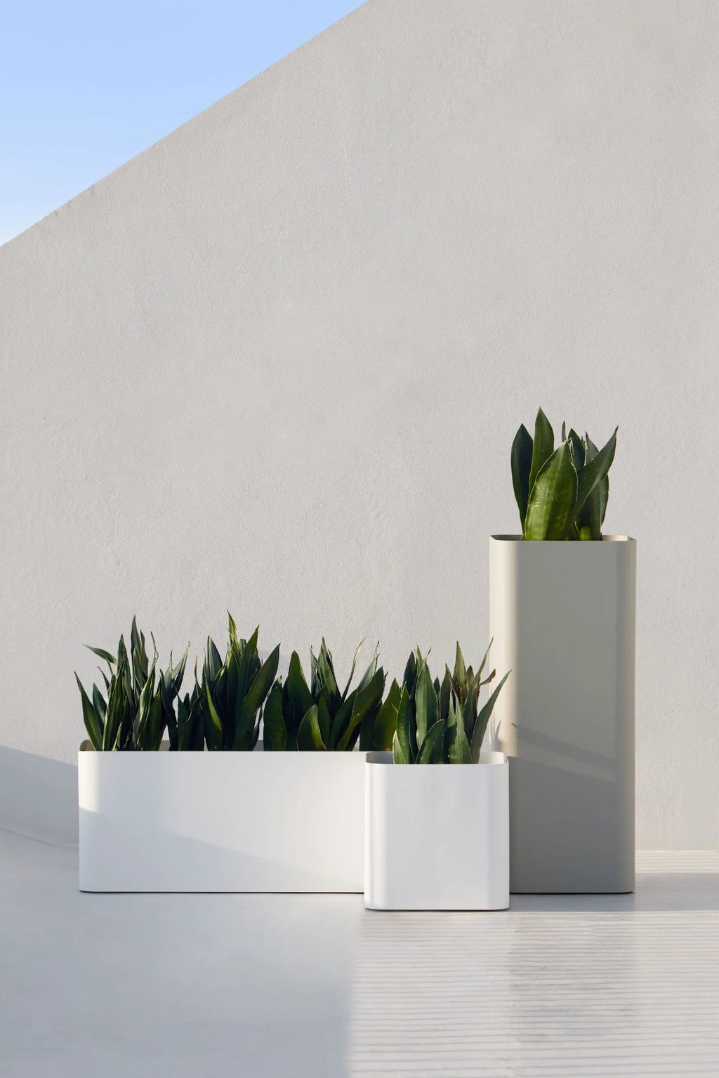 Gandia Blasco Sonora Outdoor Planter 1, a set of modern minimalist outdoor planters crafted from durable powder-coated aluminum, featuring sleek rectangular and square forms with gently rounded corners.