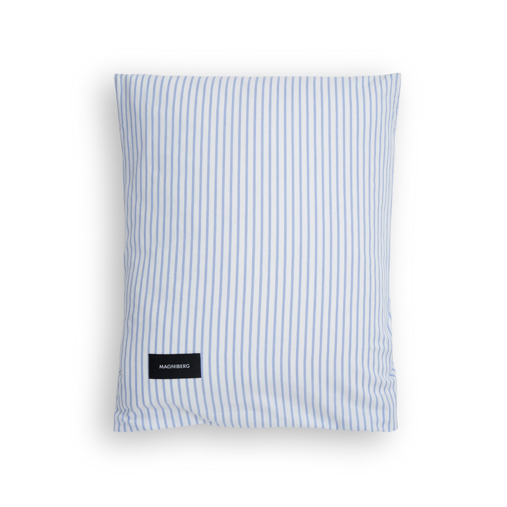 Magniberg Wall Street Pillow Case - Stripe White, a classic white and light blue striped pillowcase crafted from crisp cotton percale, featuring a timeless pinstripe pattern and a smooth, cool finish. Perfect for creating a clean, minimalist, or Scandinavian bedroom aesthetic with a touch of hotel-inspired luxury.