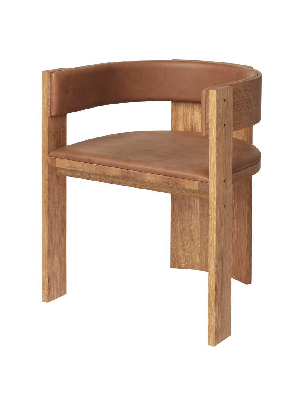 Kristina Dam Collector Dining Chair - Leather, a modern minimalist dining chair featuring a robust frame crafted from natural light solid oak with a distinctive chunky profile and integrated curved backrest. It boasts plush warm tan leather upholstery on both the seat and back, creating a sophisticated and comfortable aesthetic with clean Scandinavian lines. Perfect as a stylish dining room chair, kitchen accent, or contemporary home office seating.