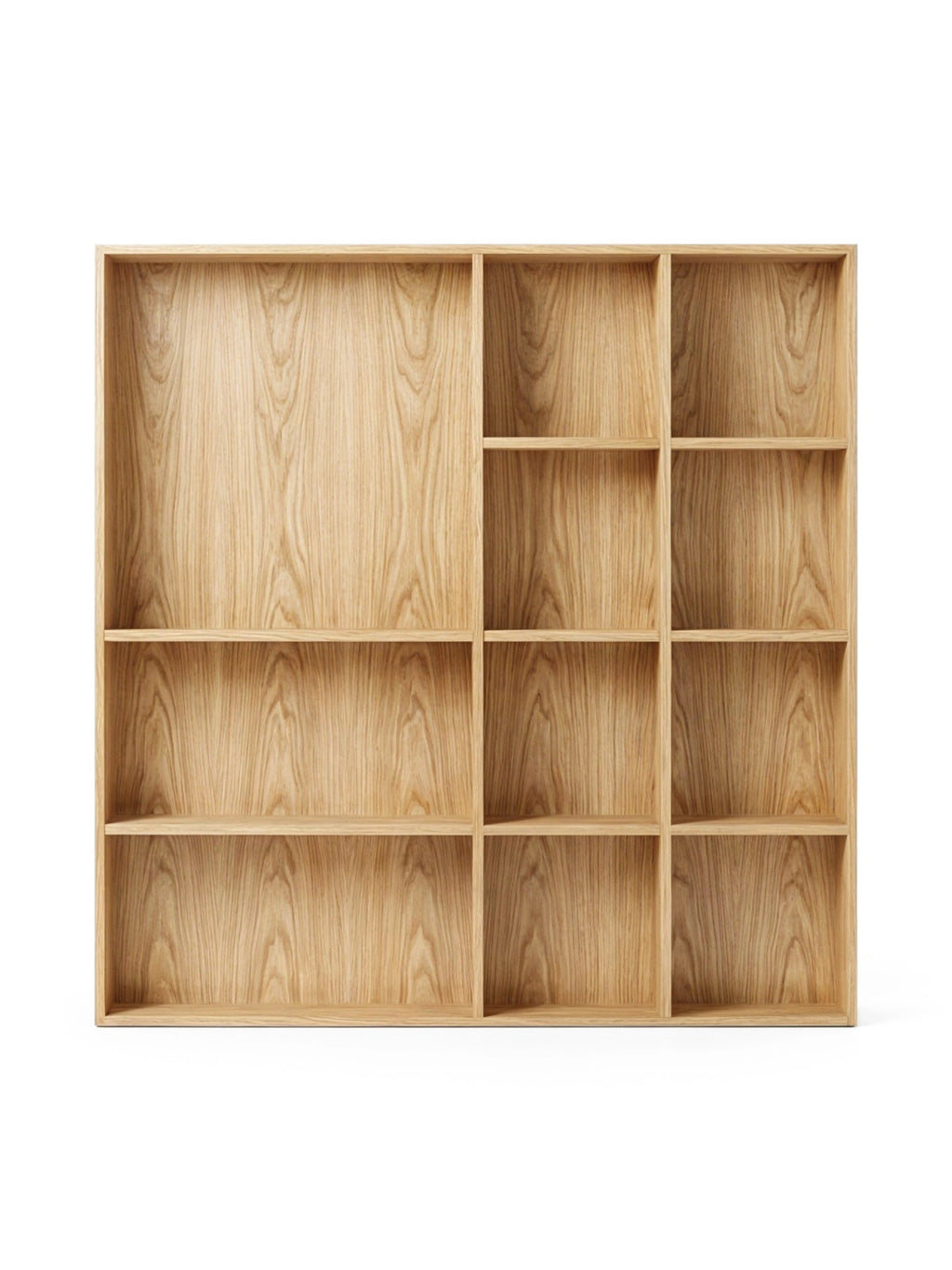 Porventura Atlas Wall Cabinet, a modern minimalist shelving unit crafted from natural solid oak wood with a visible light grain and warm blonde tones. This contemporary modular storage features an asymmetrical cubby design, perfect for displaying books and decor. Ideal as a Scandinavian media storage solution or a versatile bookcase for living rooms and home offices.