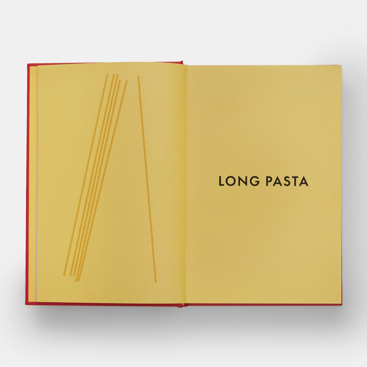  A close-up of The Silver Spoon Pasta, showcasing the golden hue and perfect spiral shape
