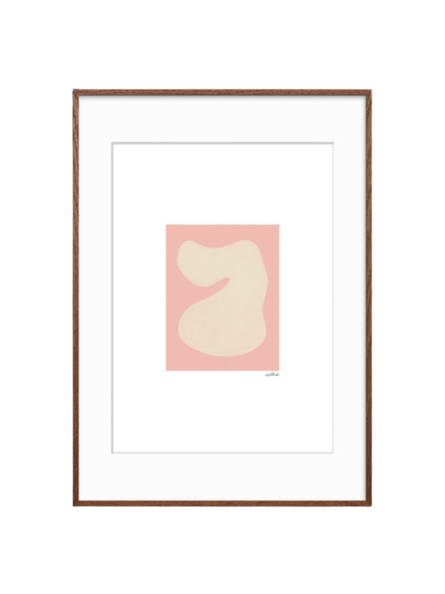 The Poster Club Shape Study 01, a minimalist abstract art print featuring a creamy organic shape with subtle texture against a soft blush pink background, framed with a crisp white mat in a warm dark walnut wooden frame. Perfect for contemporary gallery walls, Scandinavian bedrooms, or adding a touch of organic modern art to a living room.