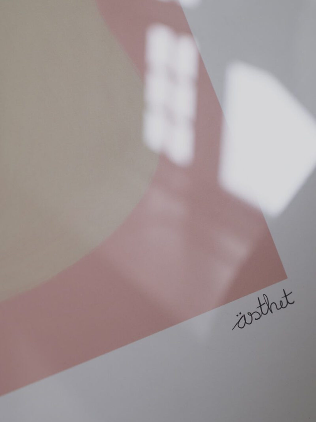 The Poster Club Shape Study 01, a modern minimalist abstract art print featuring soft organic shapes in pale beige and blush pink against a crisp white background. This contemporary geometric design combines curved and angular elements, signed 'ästhet', creating a serene and balanced composition. Ideal as stylish wall art for Scandinavian bedrooms, modern living rooms, or minimalist gallery walls.