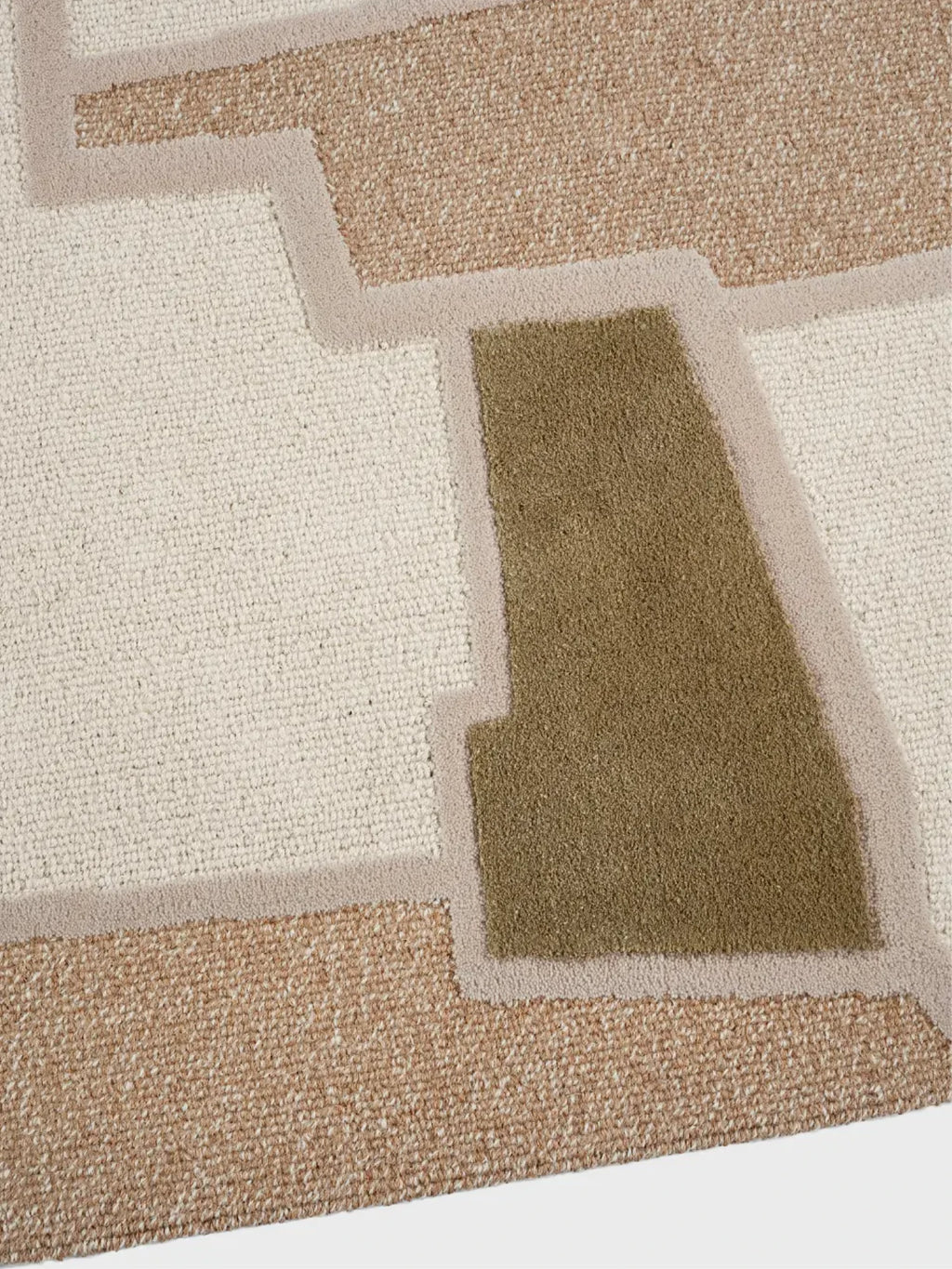 alp_ Tierras Nature Rug, a hand-tufted wool blend area rug featuring an abstract geometric pattern in a palette of cream, light beige, and olive green with varying pile heights for a rich textured finish. This organic modern rug is perfect for adding warmth and contemporary style to minimalist living rooms or natural bedrooms.