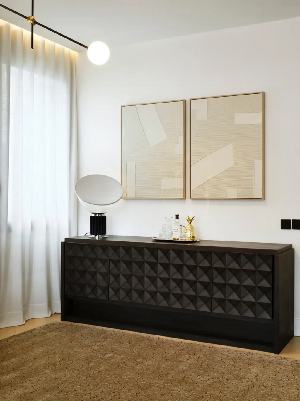 alp_ Tronc Rug, a warm brown wool area rug featuring a unique organic textured pattern reminiscent of cracked earth or tree bark, with subtle variations in its rich camel and tan tones. This contemporary natural fiber rug is perfect for adding an organic modern touch to living rooms, bedrooms, or cozy minimalist spaces.