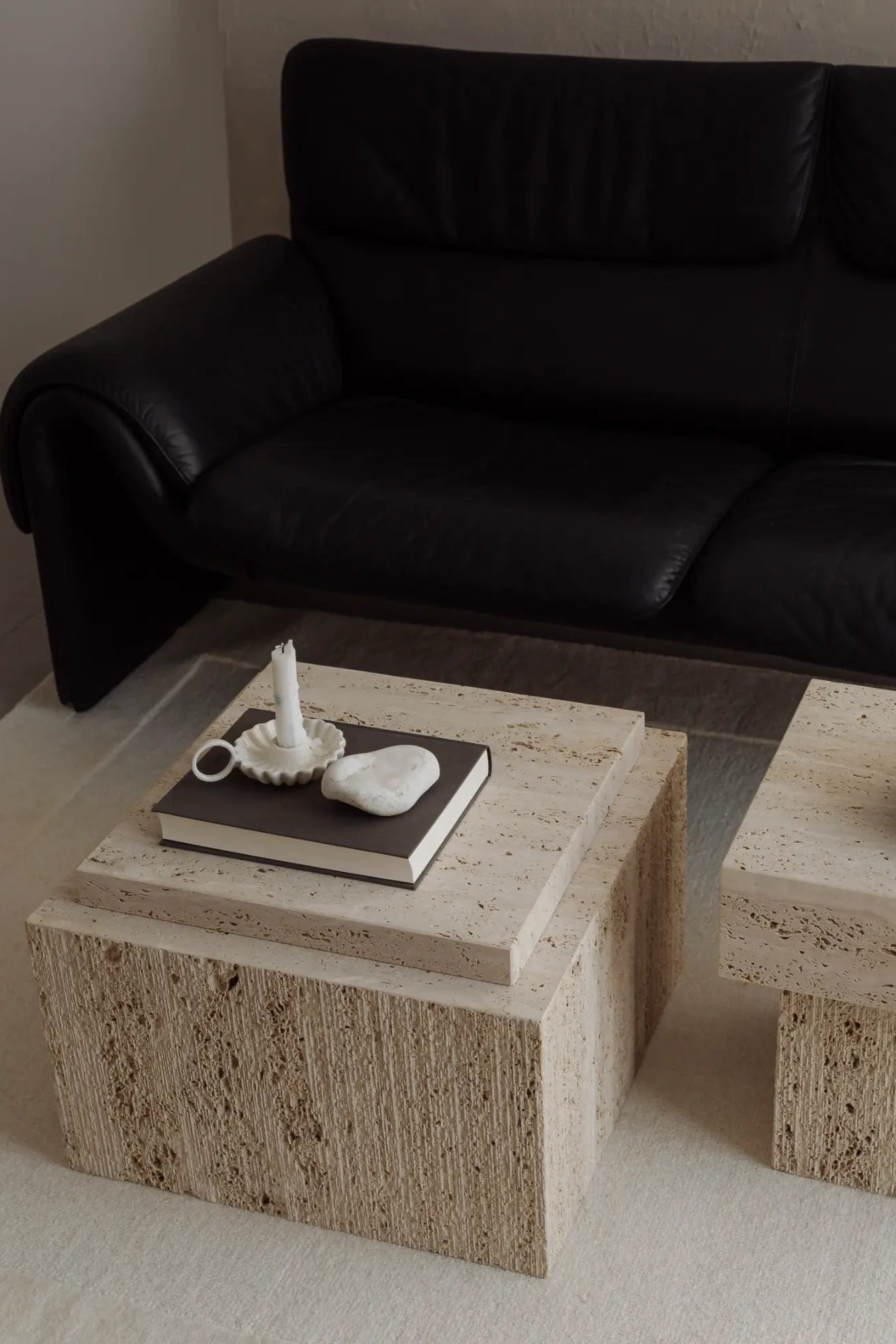 Contemporary metal side table with unique curved design and gold finish